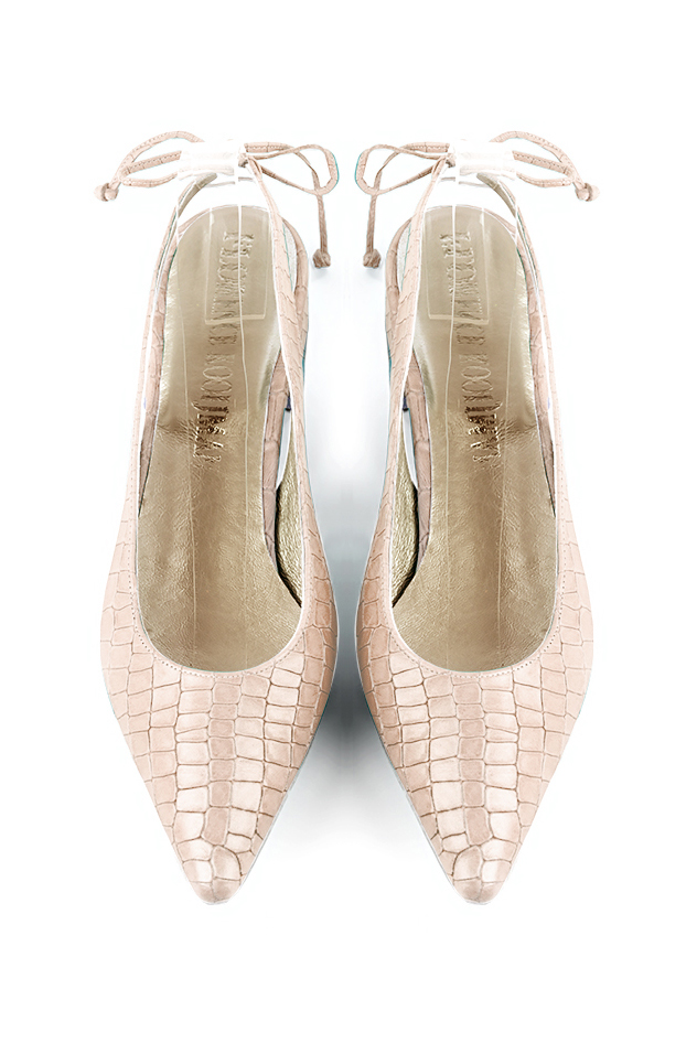 Women's powder pink elegant slingback heels. Pointed toe. Flat flare heels - Top view